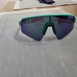 Oakley Shield Sunglasses in Teal Frame with Blue-Purple Mirrored Lens